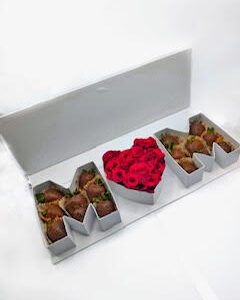 Mother’s Day gift box with ‘MOM’ shaped trays filled with chocolate-covered strawberries and fresh red roses in a heart-shaped box – perfect gift for moms in Louisville KY